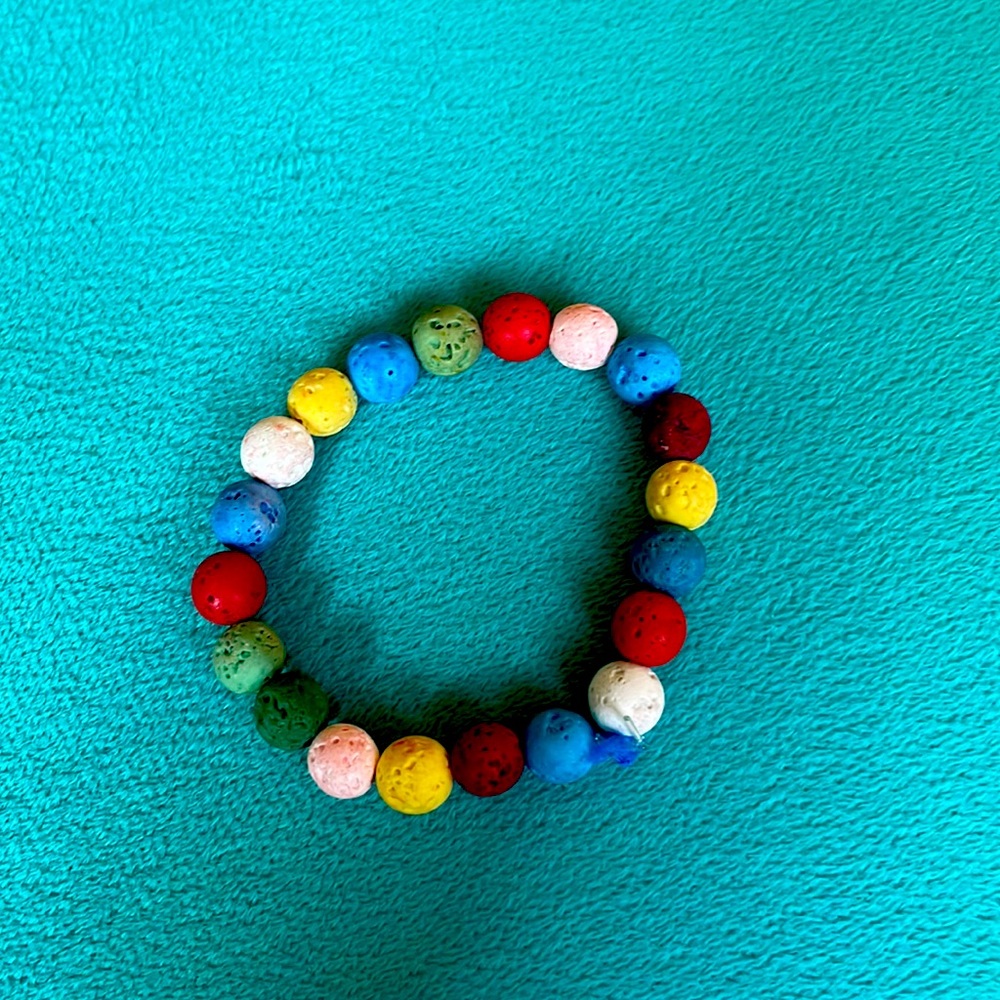 Rainbow lava bead bracelet made by me:))